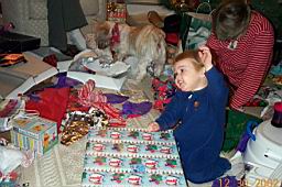DCP_2327-Tyler-opening presents is SOO much fun.JPG